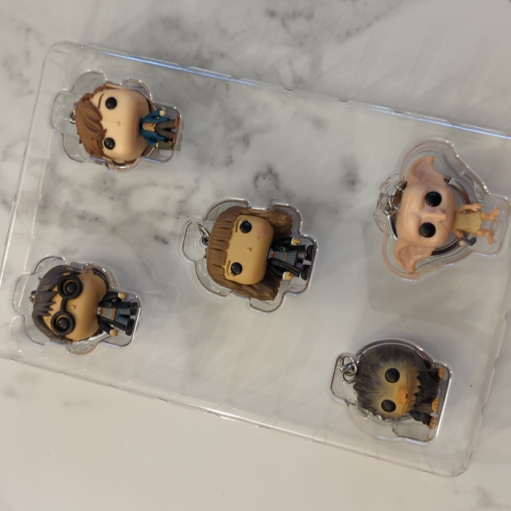 Harry Potter & Fantastic Beats Commercials Collectable Key Chains.